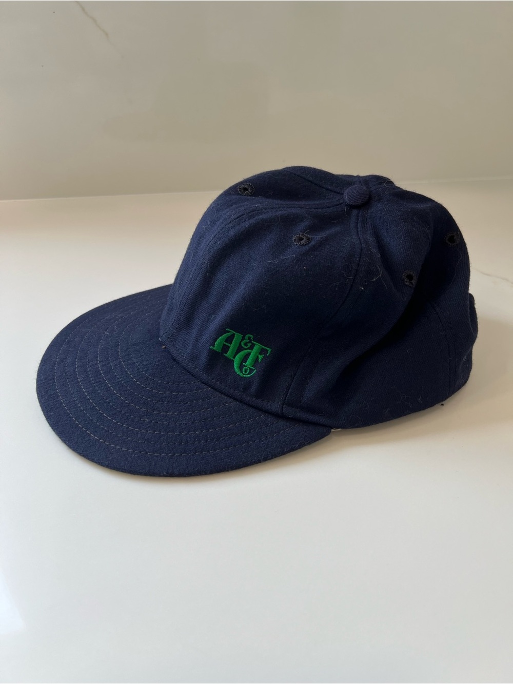 Vintage 80s Abercrombie & Fitch Navy wool snapback hat with green logo